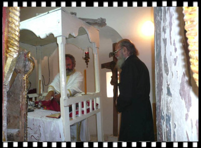 Frs__Efthimios___Antonis_at_Panagia_Altar.jpg